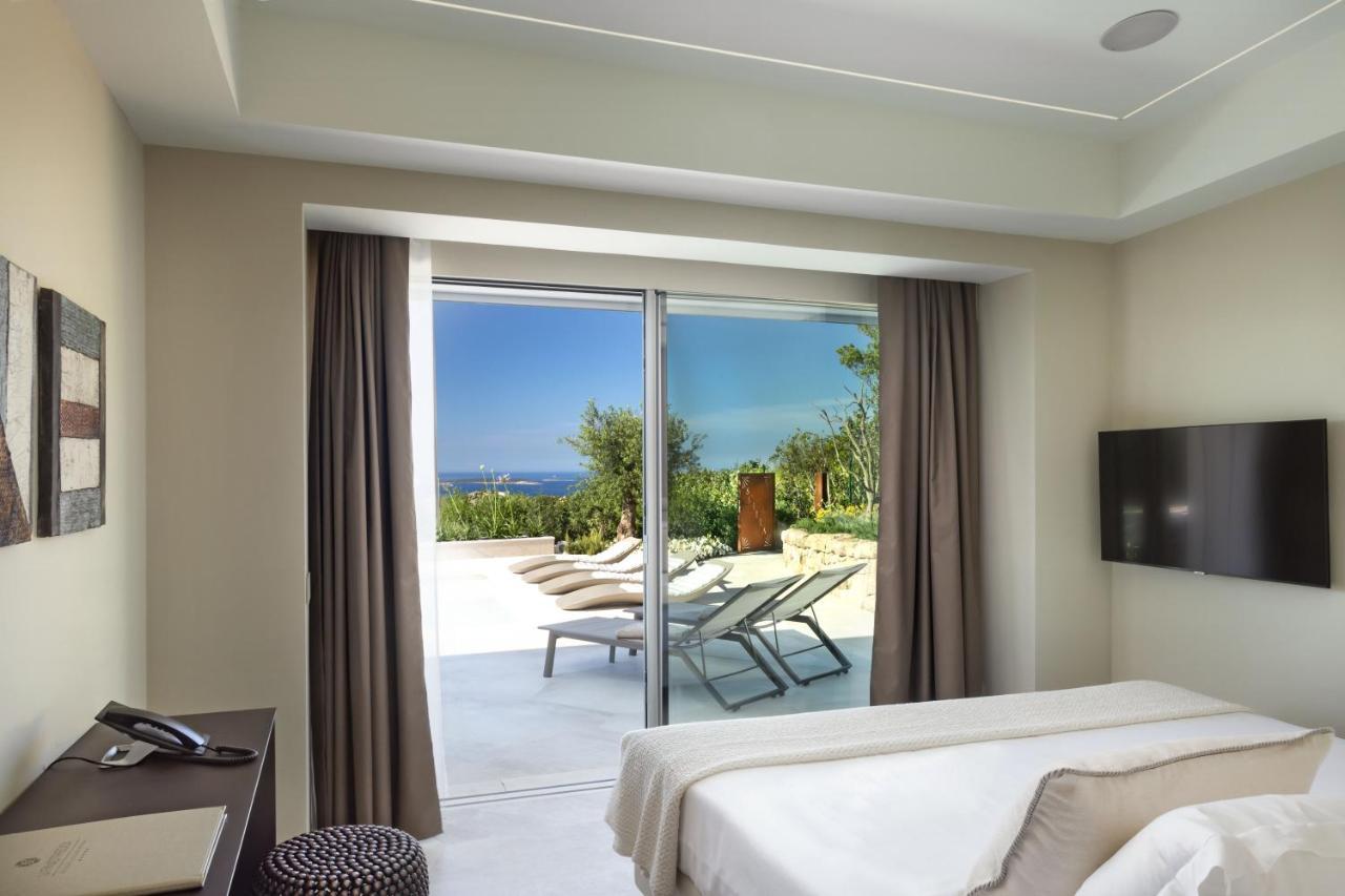 Hotel Li Finistreddi กันนิโจเน ภายนอก รูปภาพ